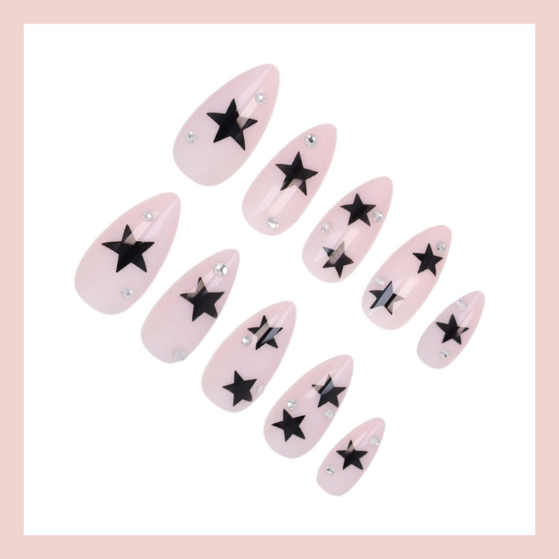 Nail art set with playful star designs Stornfield
