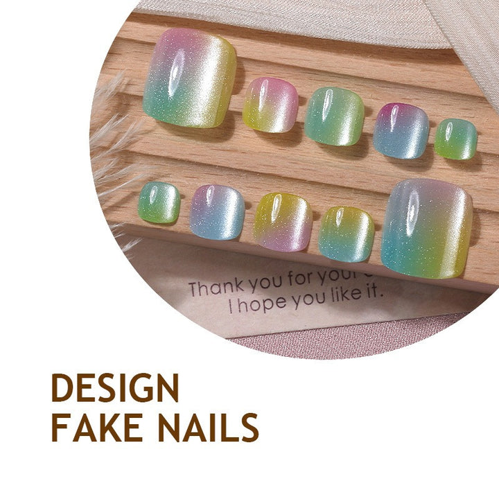 Acrylic nail set with shimmering gradient and elegant designs Stornfield