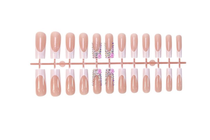 Art nail set with elegant glitter and floral accents Stornfield