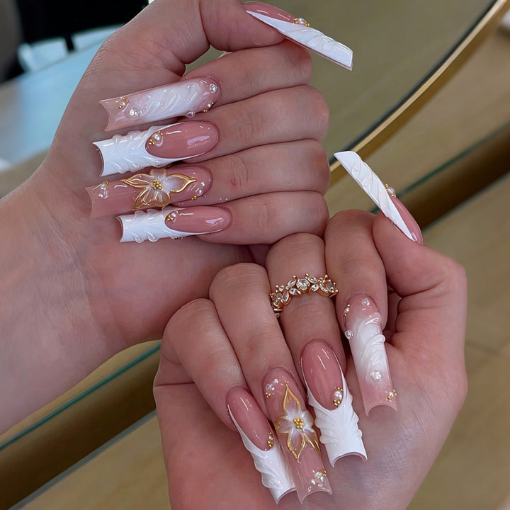 Acrylic nail set with elegant floral designs Stornfield