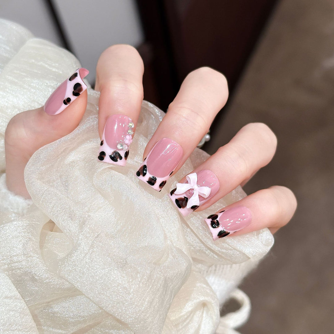Decorative Press-On Nail Set with Unique Bow and Gem Accents