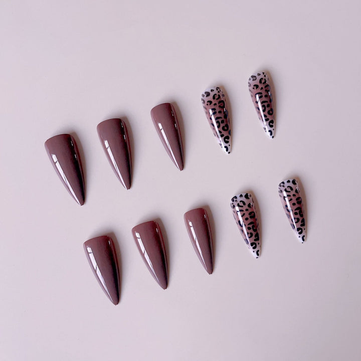 Nail set with elegant leopard pattern and modern stiletto design Stornfield