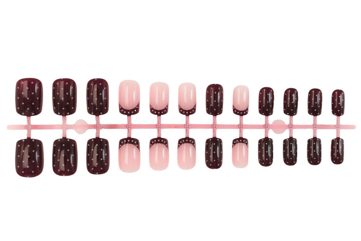 Art nail set with elegant French tips and playful accents Stornfield