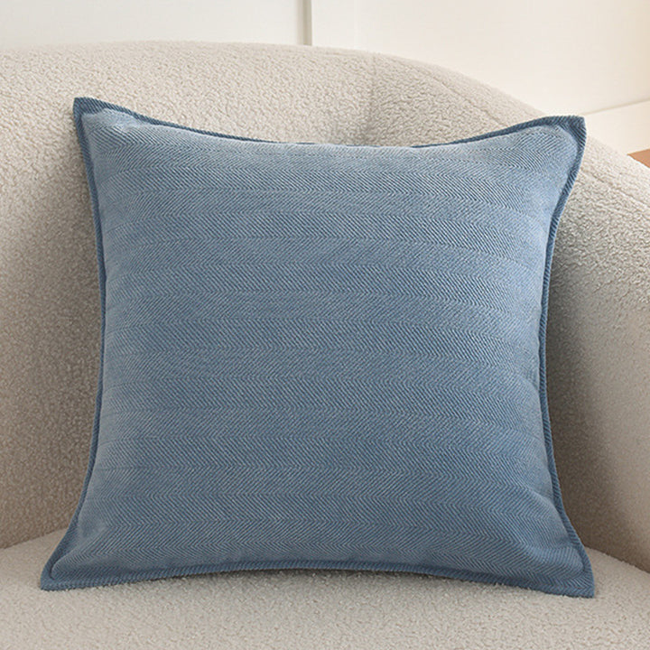 Square decorative cover with fine herringbone pattern and piping edge Stornfield