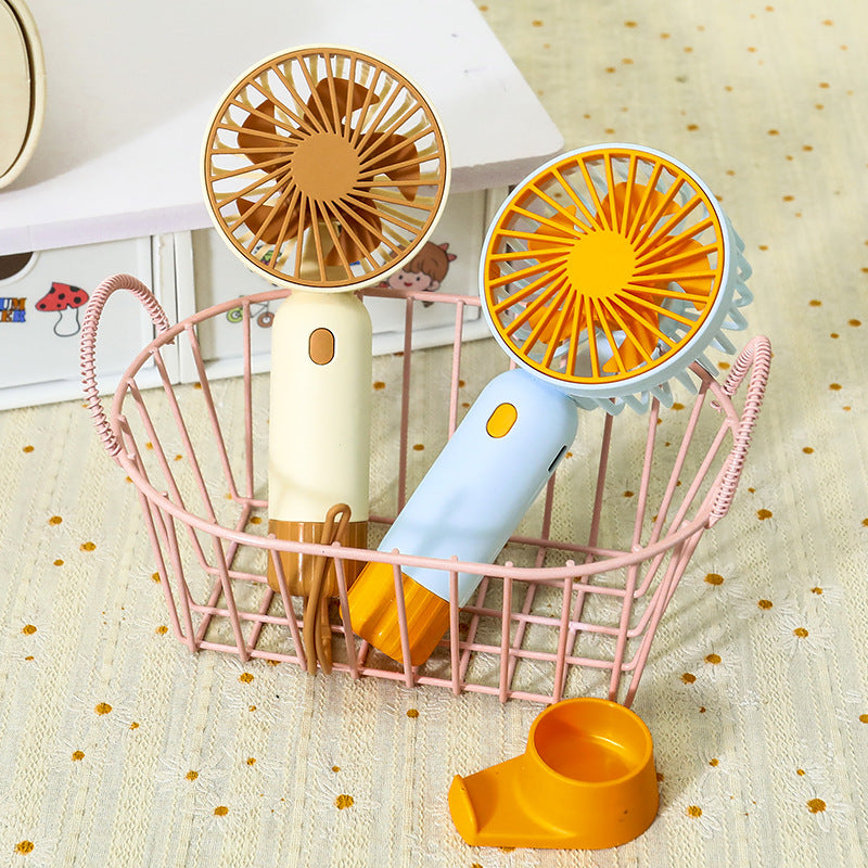 Women's Portable Mini Fan with Ergonomic Grip and USB Charging Function Stornfield