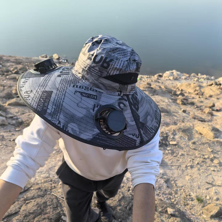 Ventilated sun hat with integrated solar fans and wide brim Stornfield