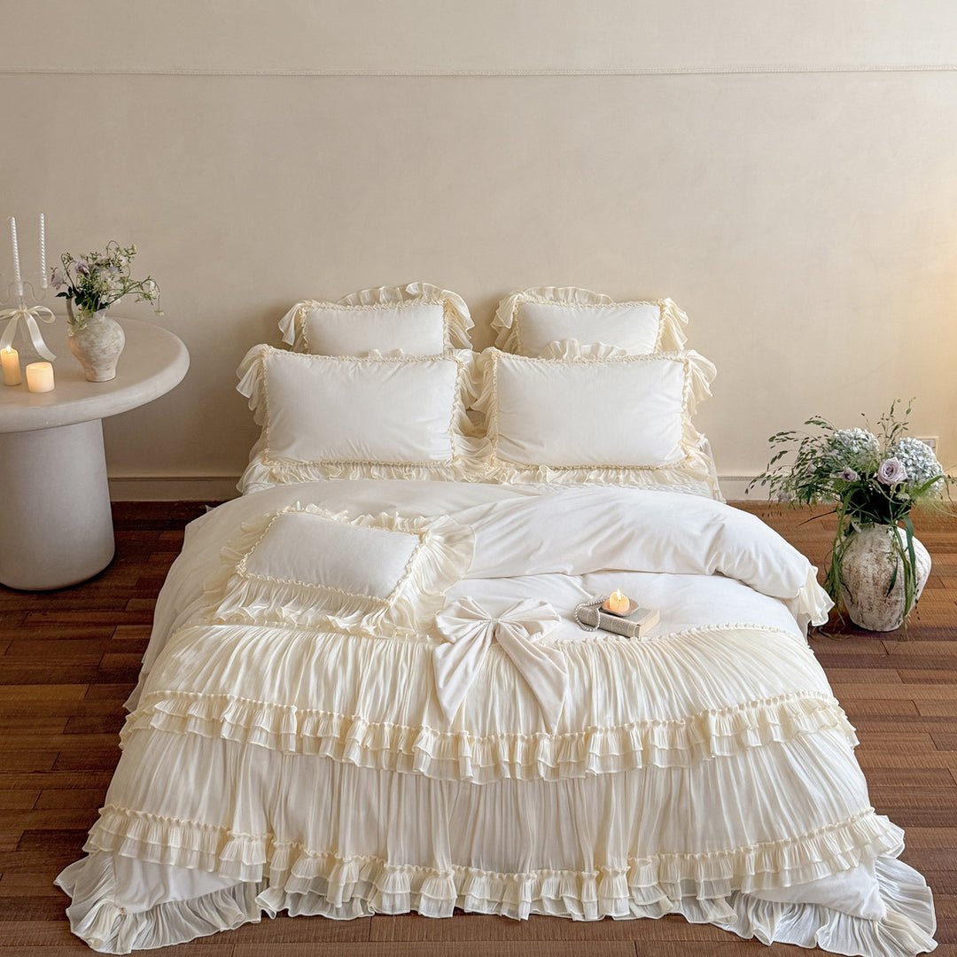 Romantic ruffled velvet bed set with pleated frills and decorative cushions