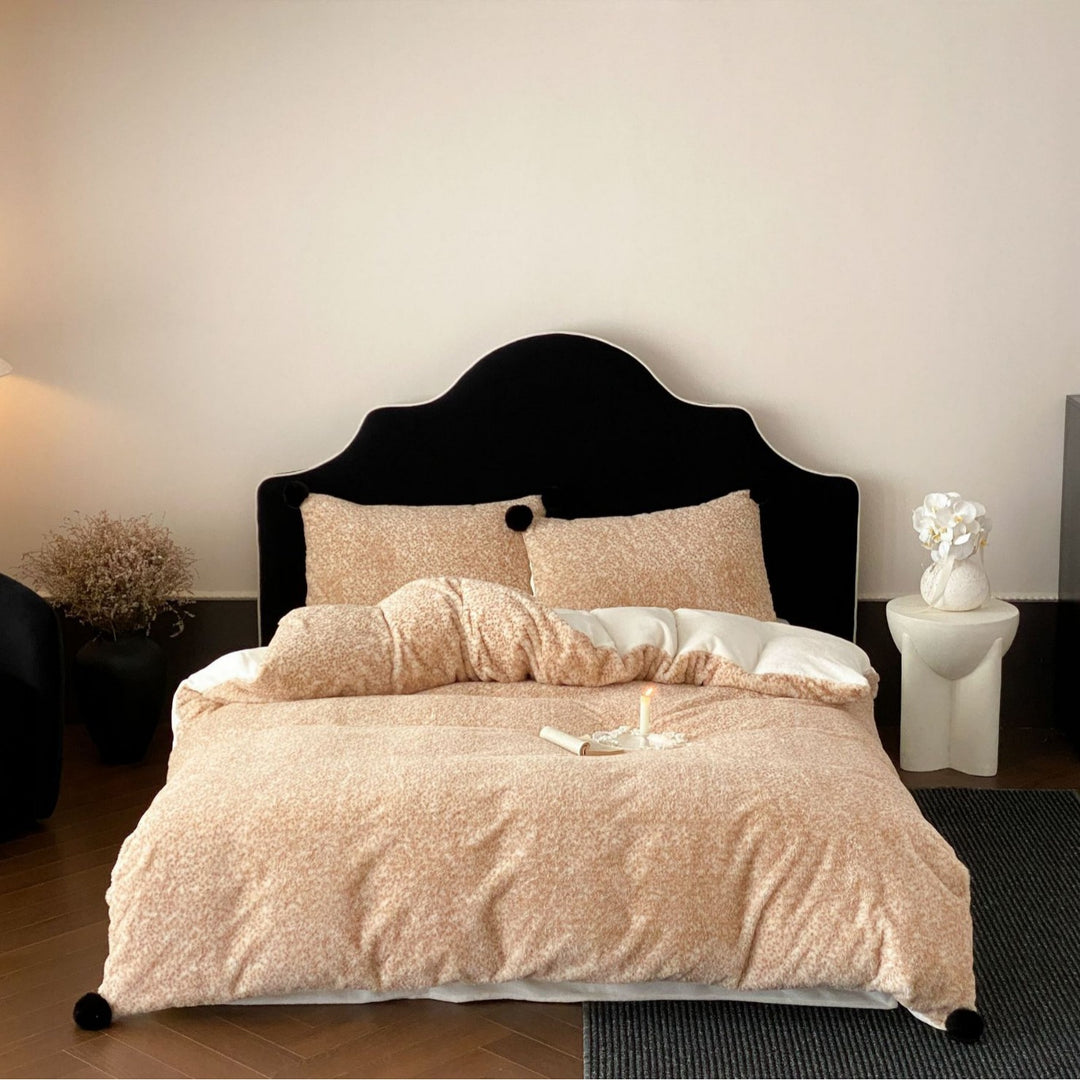 Bedding set made of soft cotton blend with decorative pom poms and reversible back