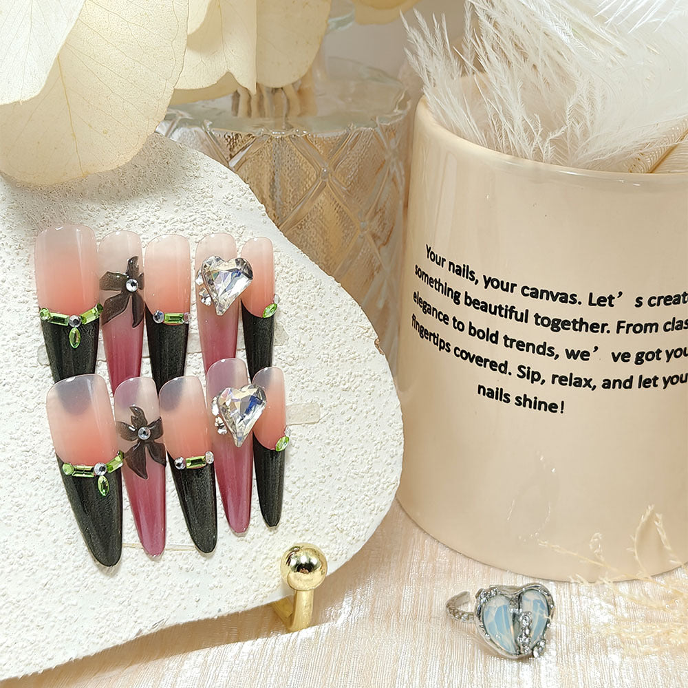 Artificial nails with elegant tip design and glitter accents Stornfield