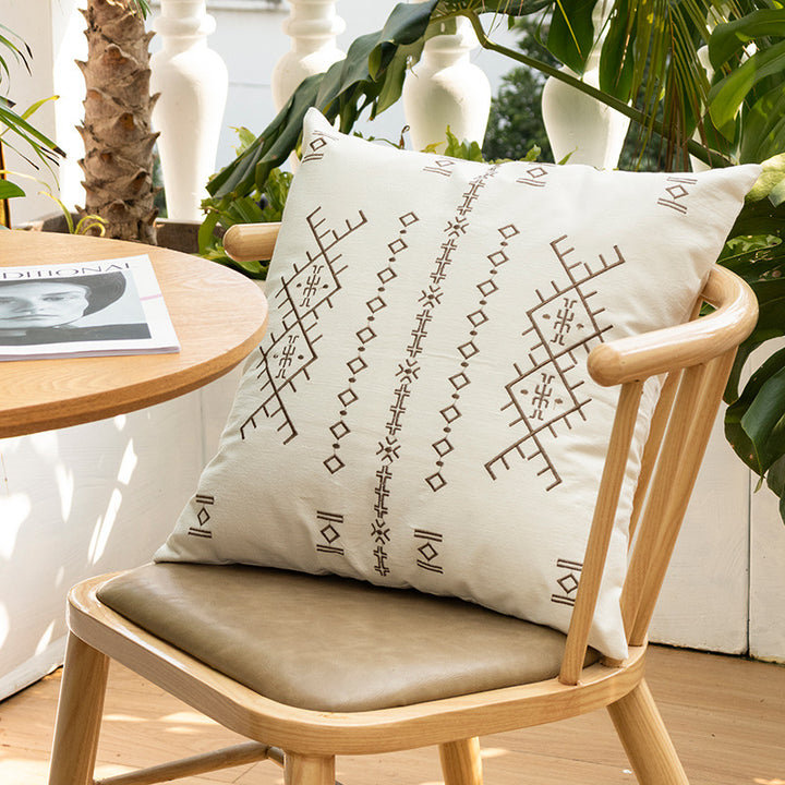 Square decorative cushion with fine relief embroidery in ethnic design and removable cover Stornfield
