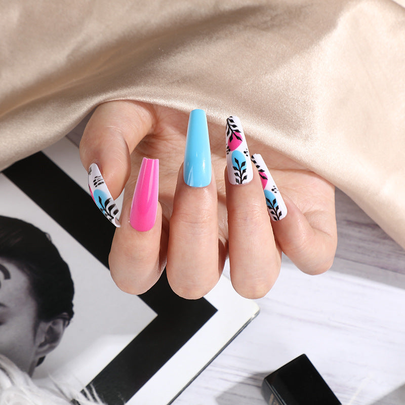 Artificial nails with floral design and creative accents Stornfield