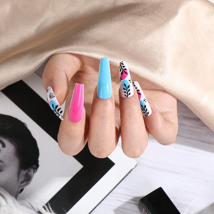 Artificial nails with floral design and creative accents Stornfield