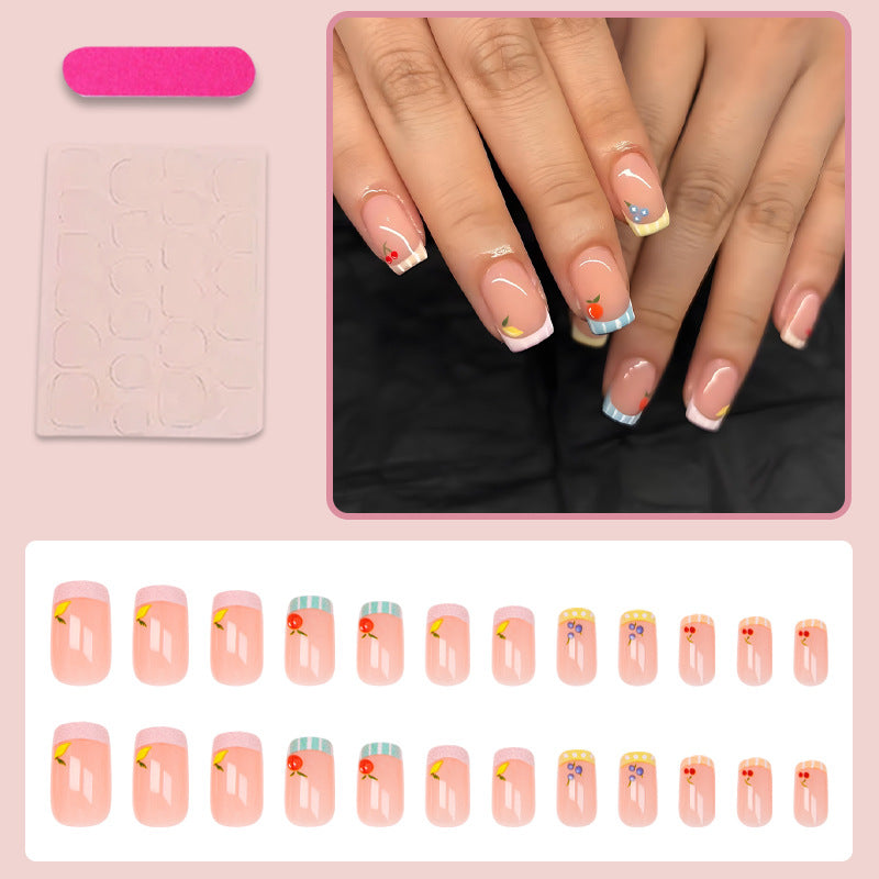Nail art set with cheerful fruit designs and colorful accents Stornfield
