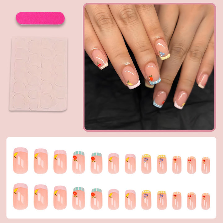 Nail art set with cheerful fruit designs and colorful accents Stornfield