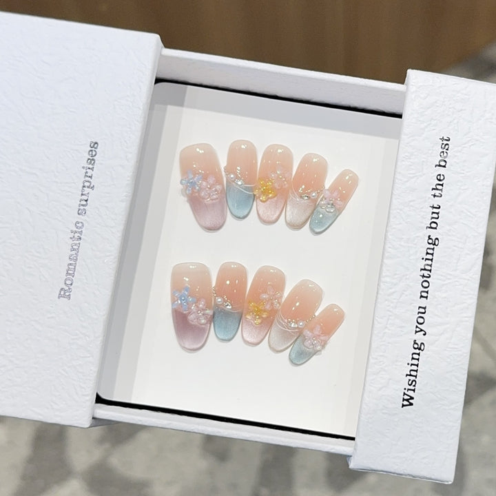 Romantic artificial nails with floral accents Stornfield