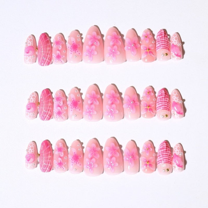 Artificial nail set with intricate 3D flowers and elegant accents Stornfield