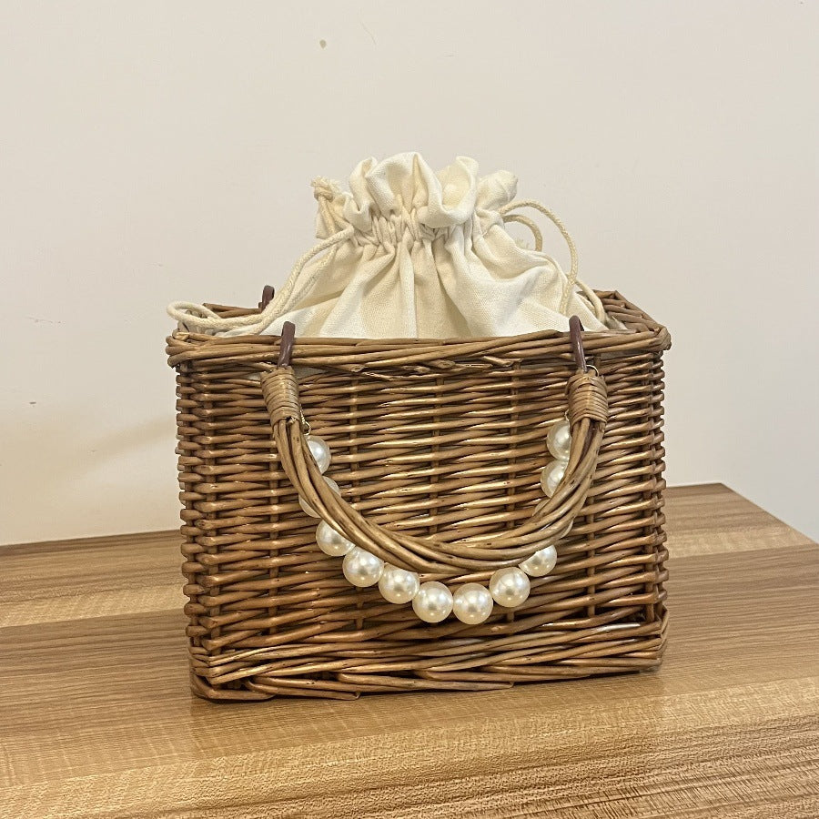 Ladies' basket bag with decorative pearl accents and bow decoration Stornfield