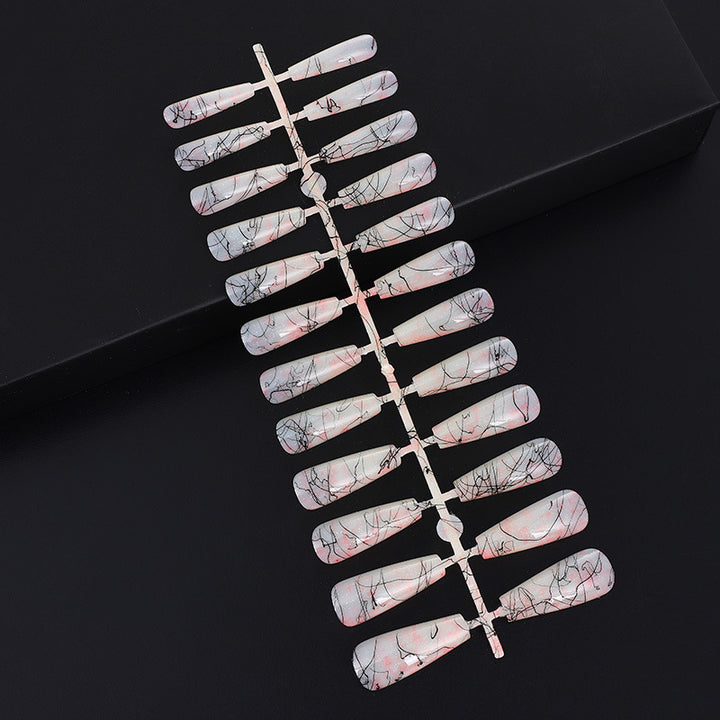 Creative nail art with blood splatter design Stornfield