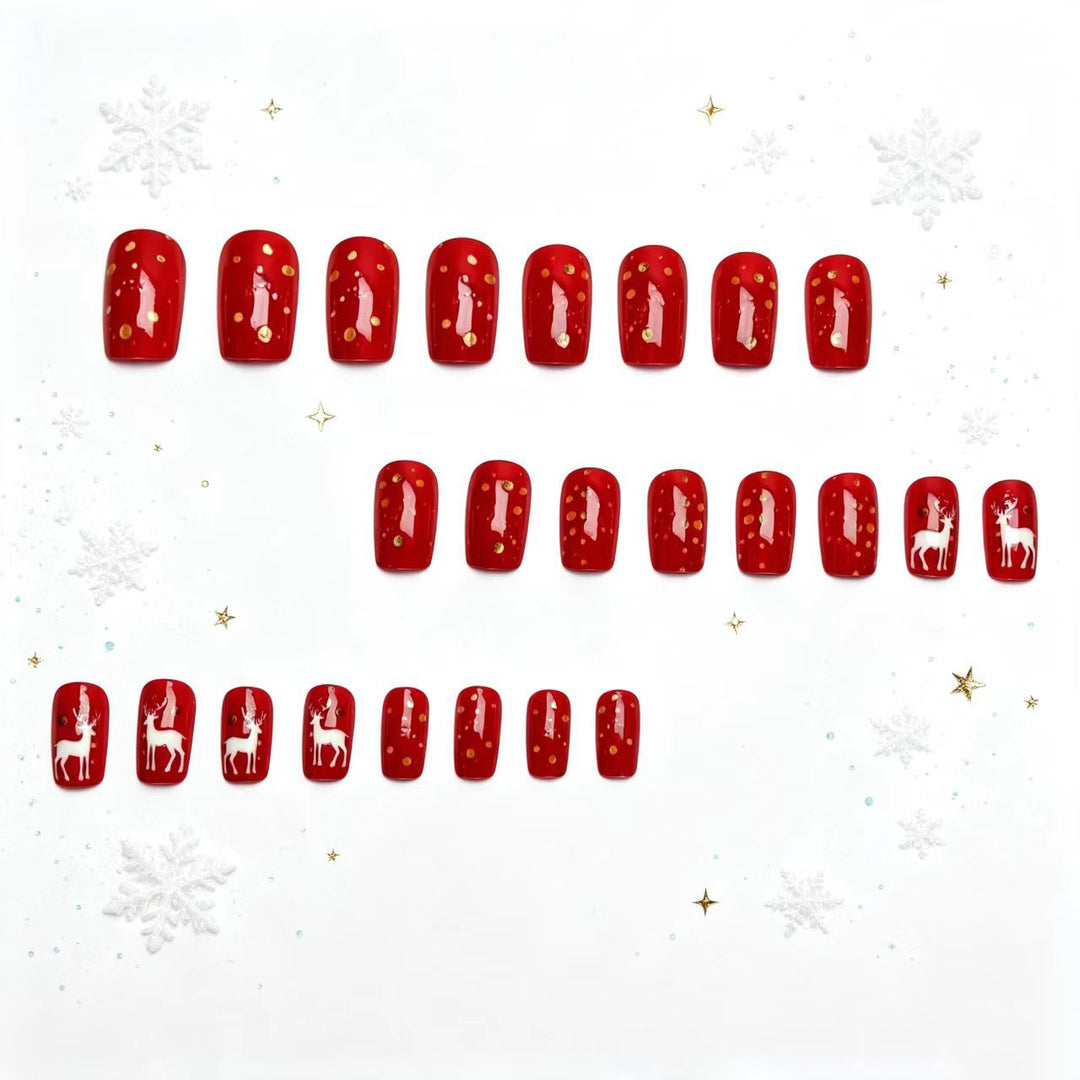 Creative artificial nails with festive reindeer design Stornfield