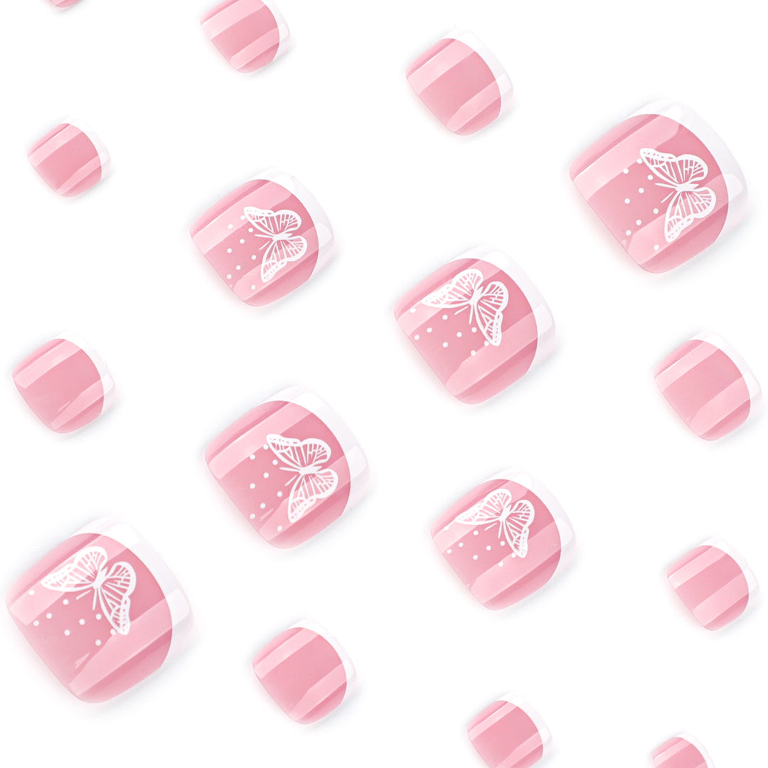 Artful toenail design with elegant butterfly motifs and French design Stornfield
