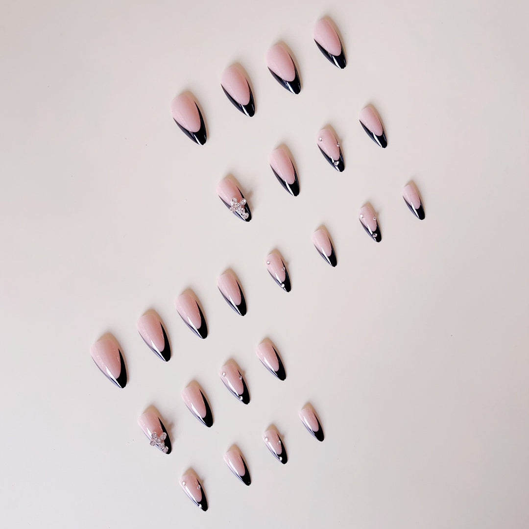 Artificial nail set with luxurious French design and radiant accents Stornfield
