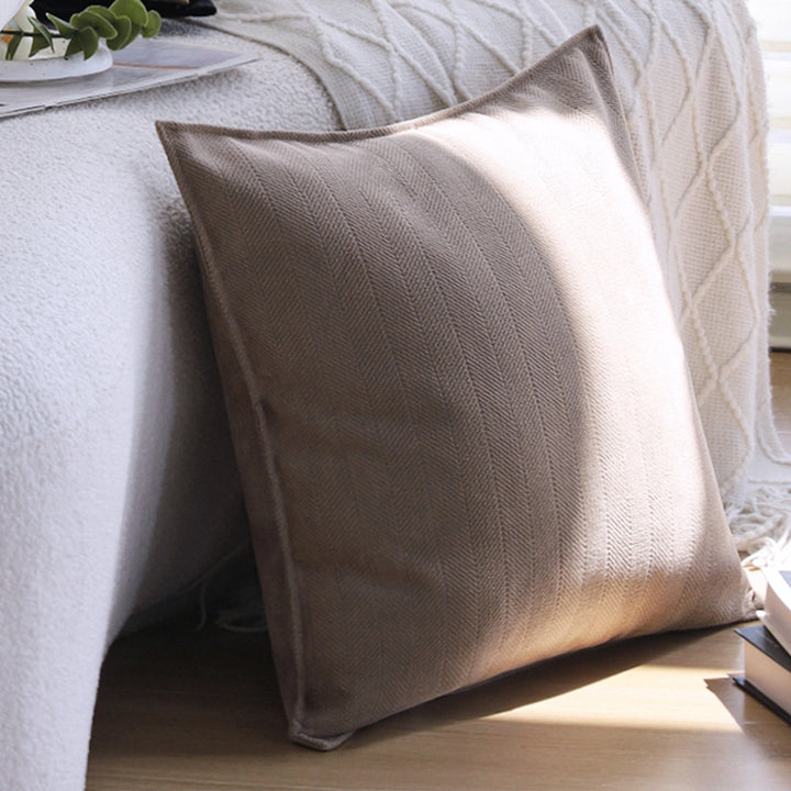 Square decorative cushion cover with hand-tufted ethnic appliqué motif and fringed edge Stornfield