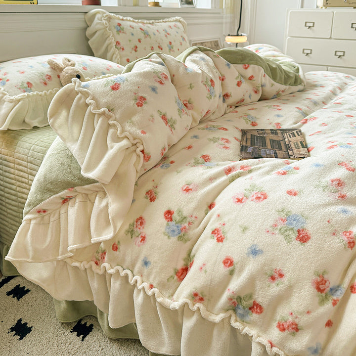 Reversible Plush Floral Comforter Set with Ruffled Skirt and Matching Pillow Shams