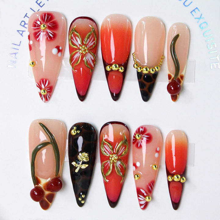 Artificial nail set with elegant floral decorations and modern accents Stornfield