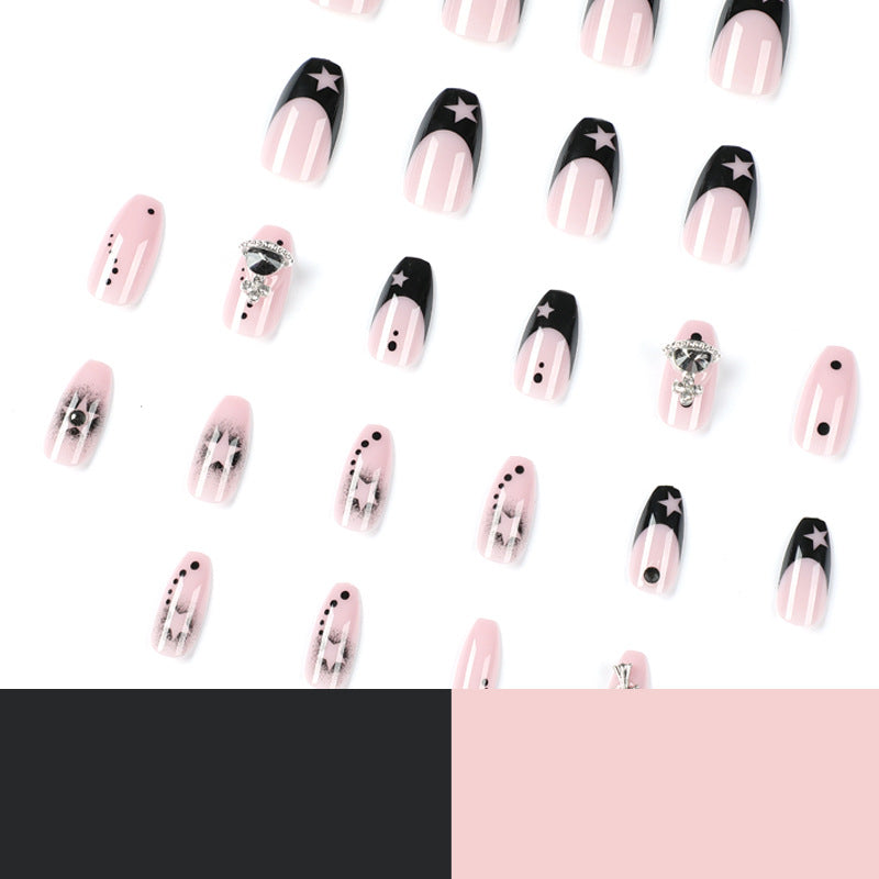 Glamorous nail art with star motifs and glitter accents Stornfield
