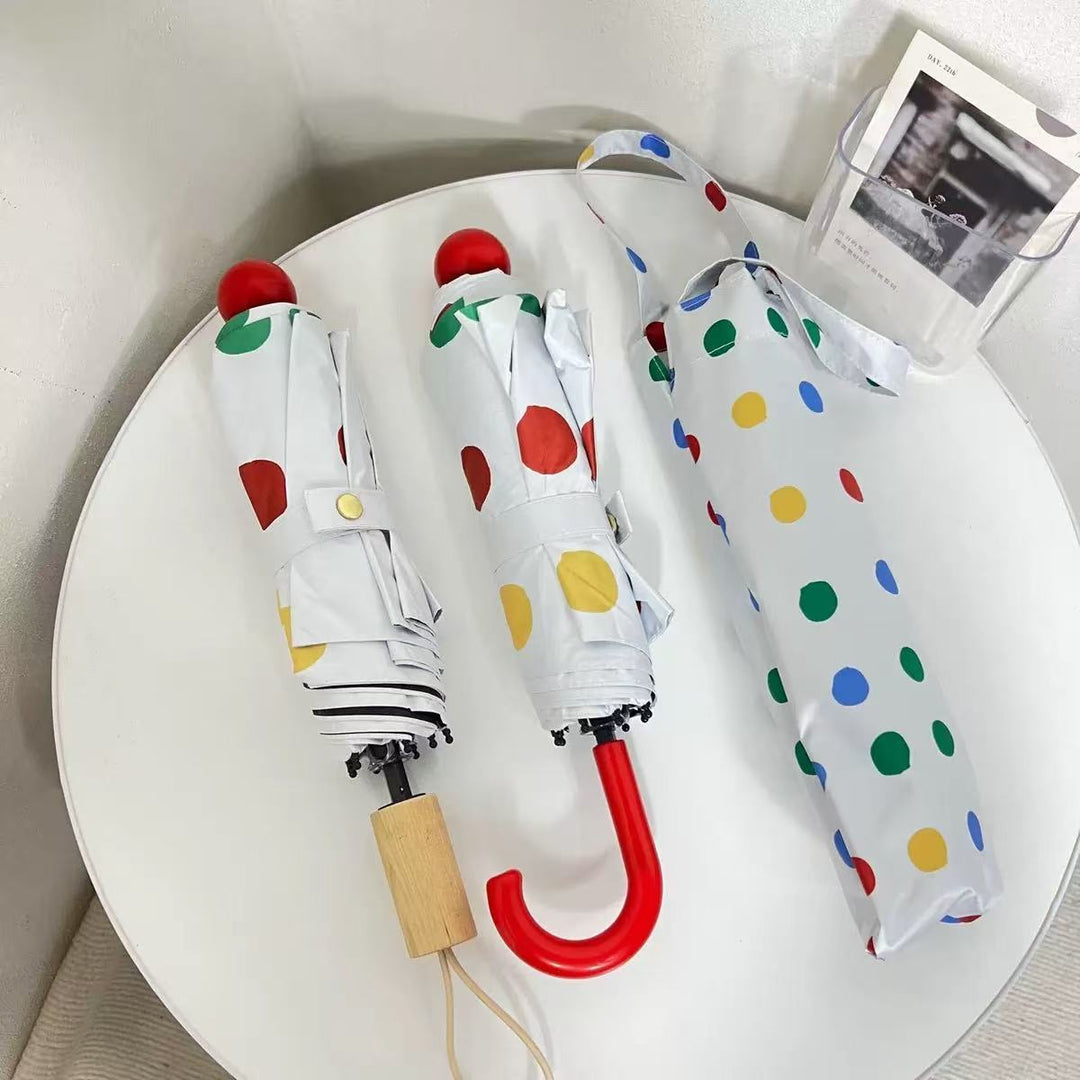 Ladies designer foldable umbrella with colorful polka dot pattern Stornfield