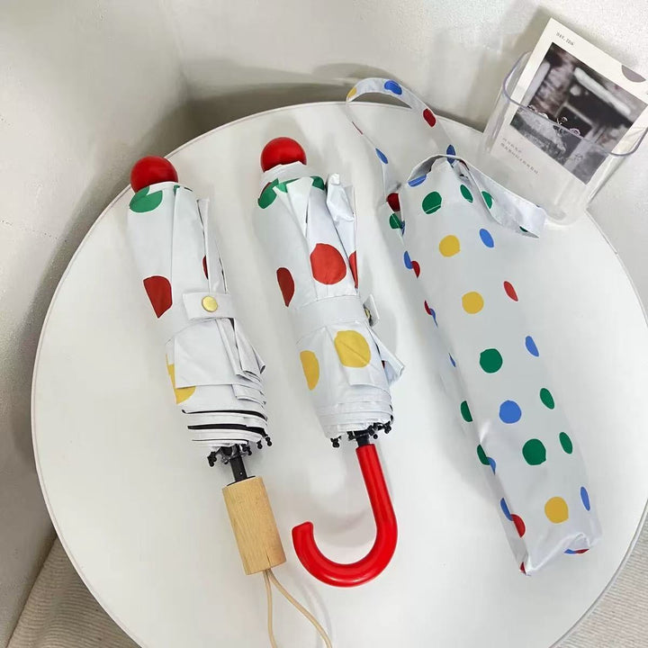 Ladies designer foldable umbrella with colorful polka dot pattern Stornfield