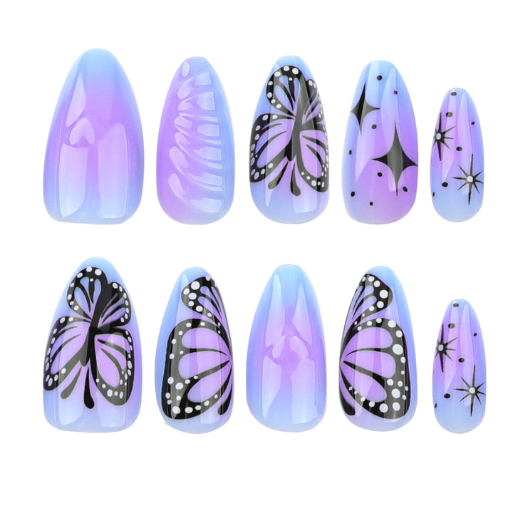 Artful stiletto nails with elegant butterfly design Stornfield