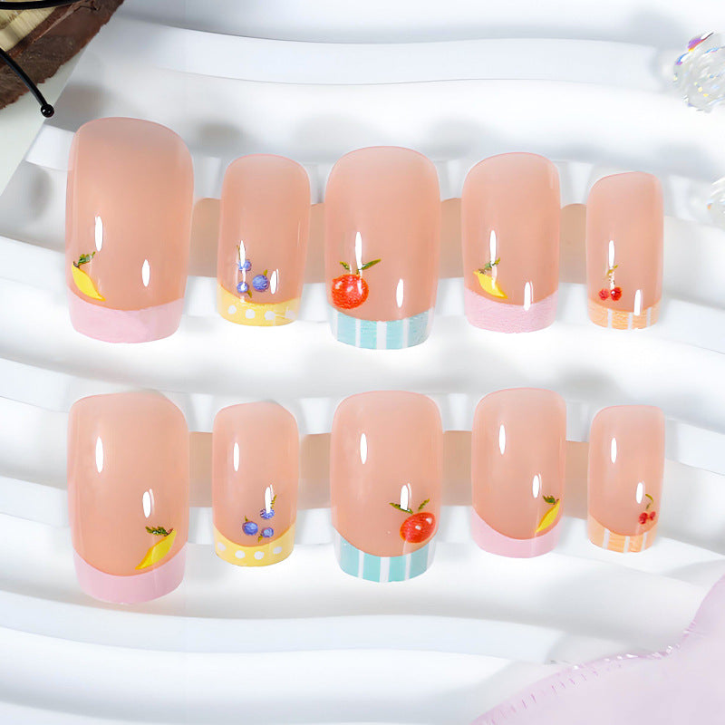 Nail art set with cheerful fruit designs and colorful accents Stornfield