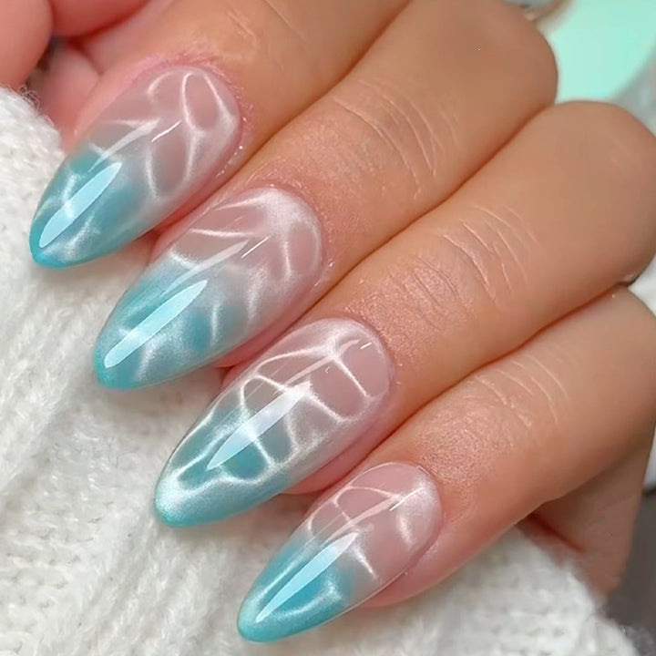 Artificial nail set with elegant gradient and shimmering accents Stornfield