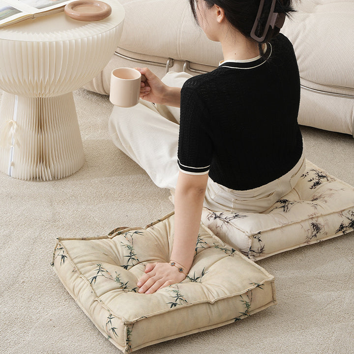 Padded square seat cushion with tufted stitching and fine bamboo print Stornfield