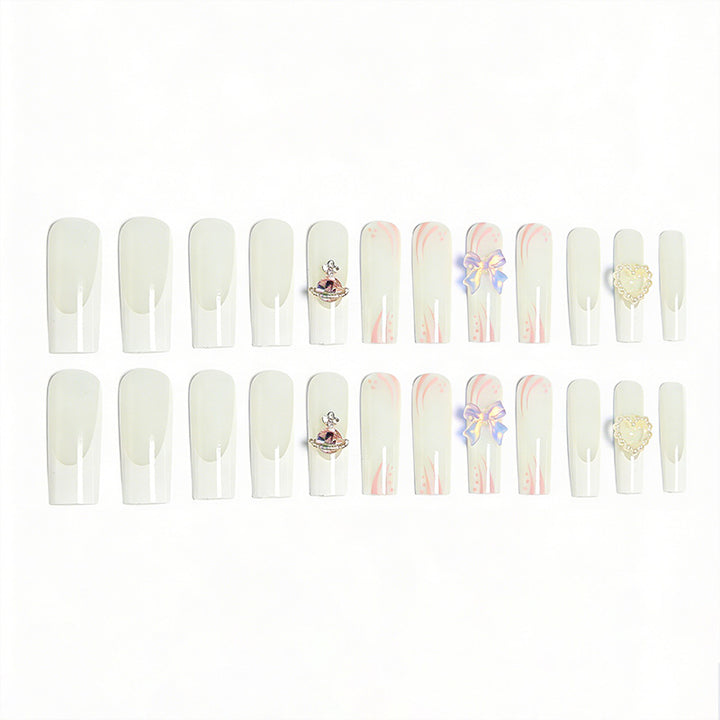 Artificial nails with delicate embellishments Stornfield