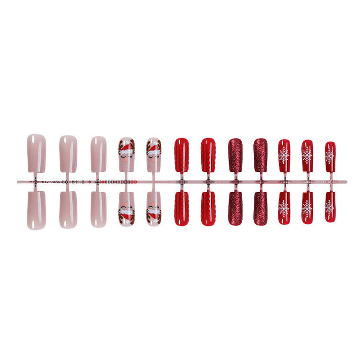 Artificial nail set with festive Christmas designs and glitter accents Stornfield