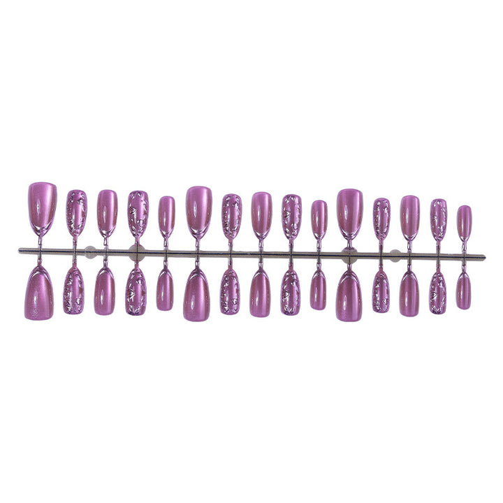 Elegant artificial nail set with shimmering accents and decorative designs Stornfield