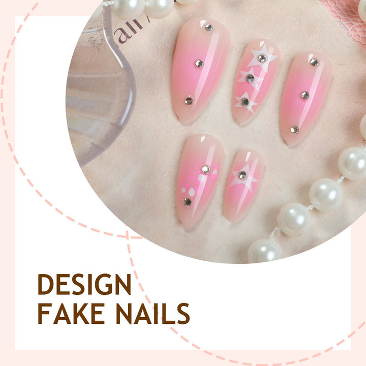 Artificial nail set with sparkling rhinestone accents and playful star motifs Stornfield