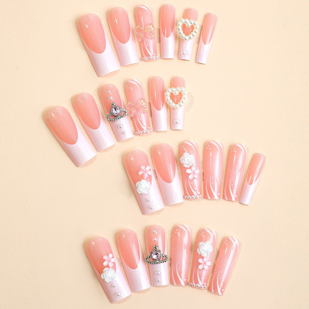 Artificial nail set with glamorous designs and decorative applications Stornfield