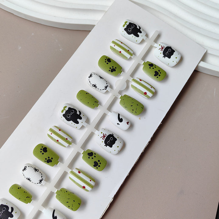 Creative art press-on nails with playful animal design Stornfield