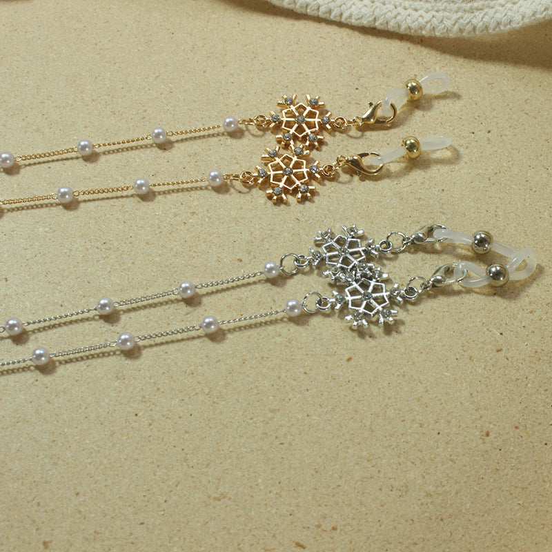 Elegant glasses holder chain with pearls and snowflake pendant Stornfield