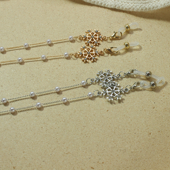 Elegant glasses holder chain with pearls and snowflake pendant Stornfield