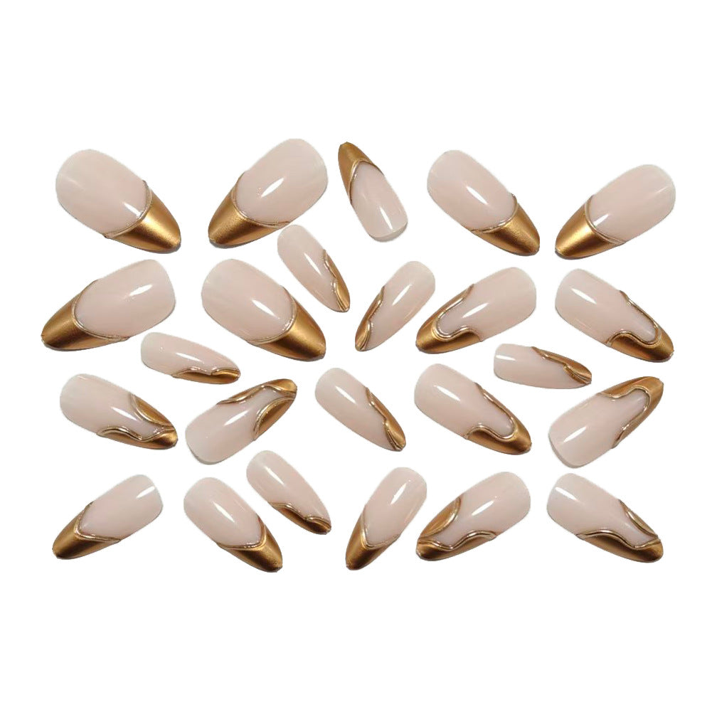 Artificial nails in elegant stiletto design with gold accents Stornfield