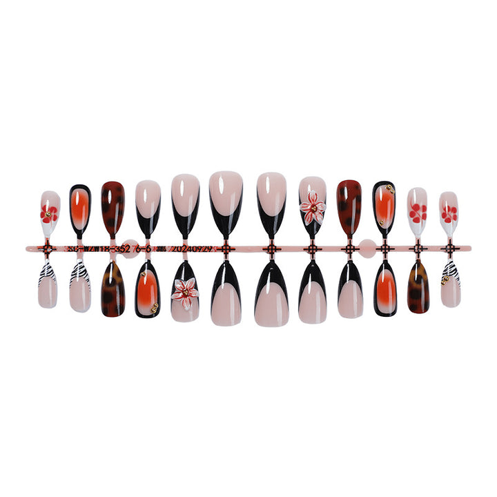 Artificial nail set with floral and creative decorations Stornfield