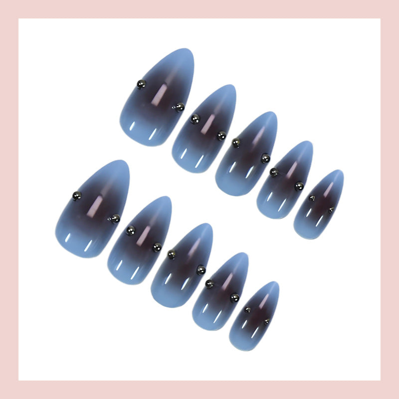 Artificial nail set with elegant gradient and decorative accents Stornfield