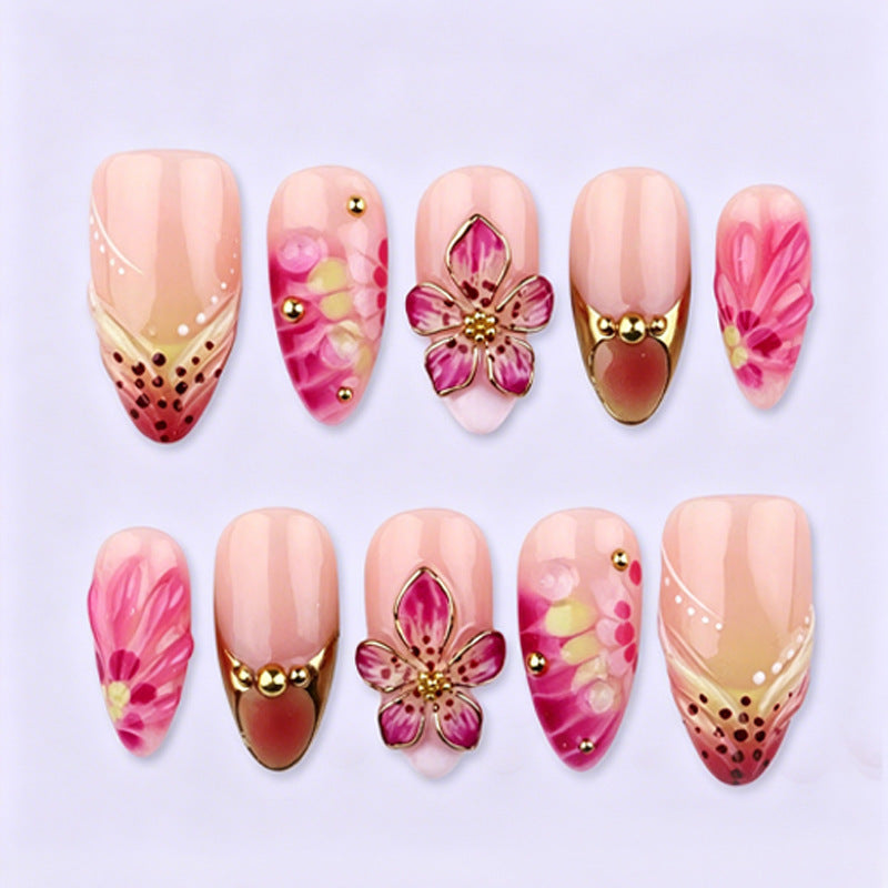 Artificial nail set with floral accents and sparkling details Stornfield