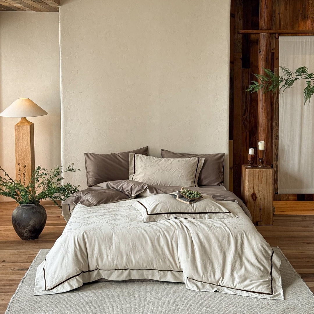 Premium bedding set made of breathable cotton blend with contrasting piping