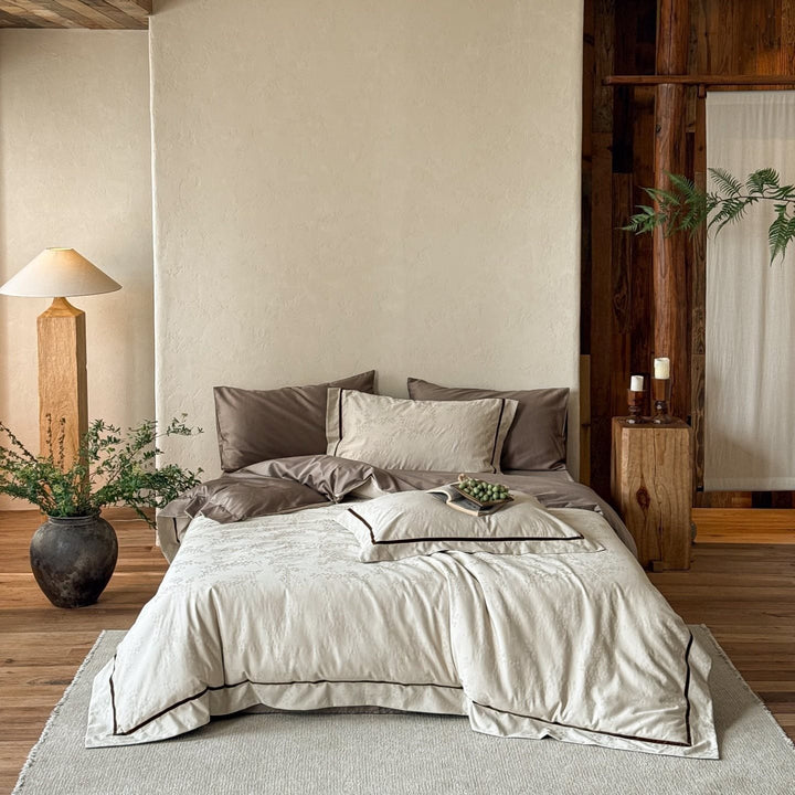 Premium bedding set made of breathable cotton blend with contrasting piping