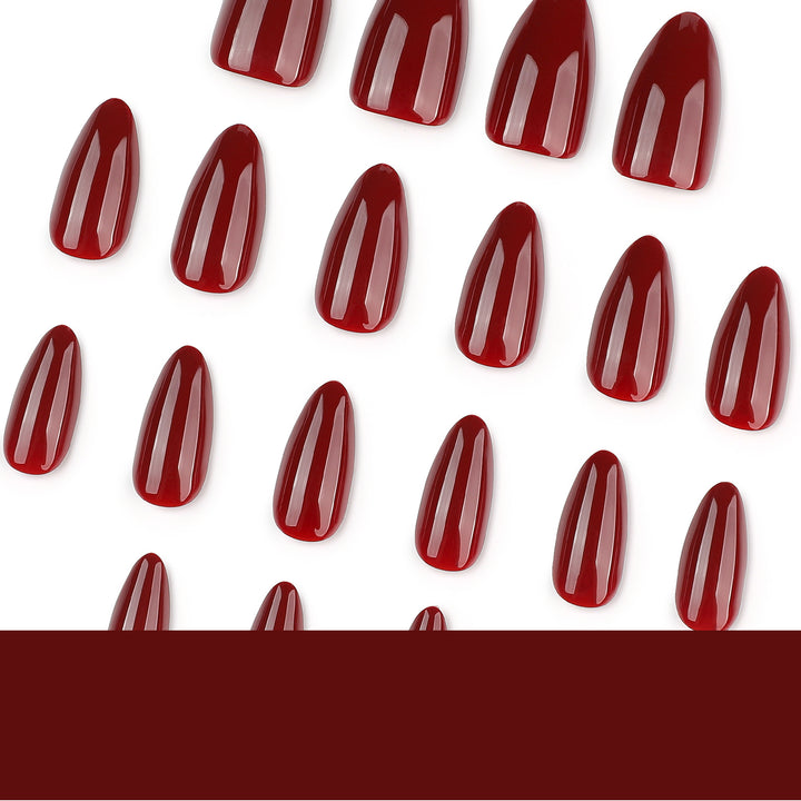 Glamorous stiletto nails with high gloss and elegant design accents Stornfield